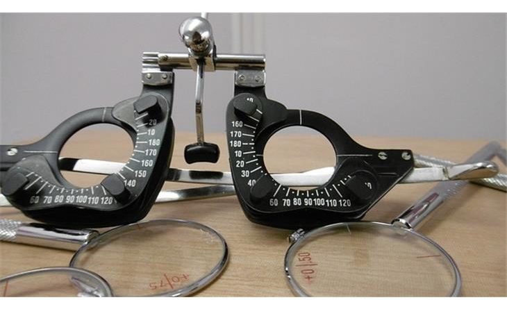 Optometry lens box calibration device